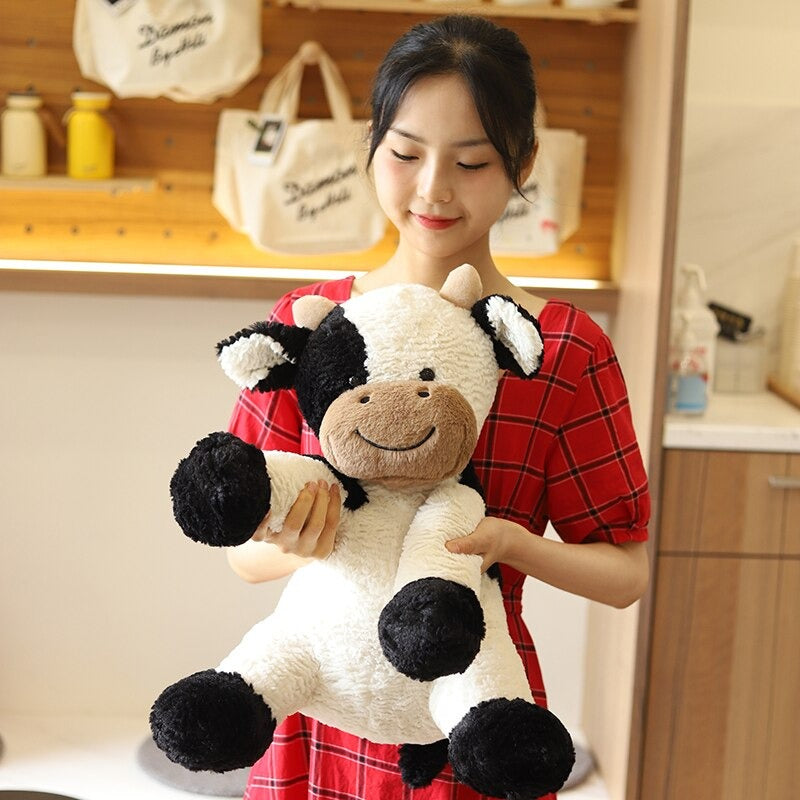 The Sitting Cow Plush Toy